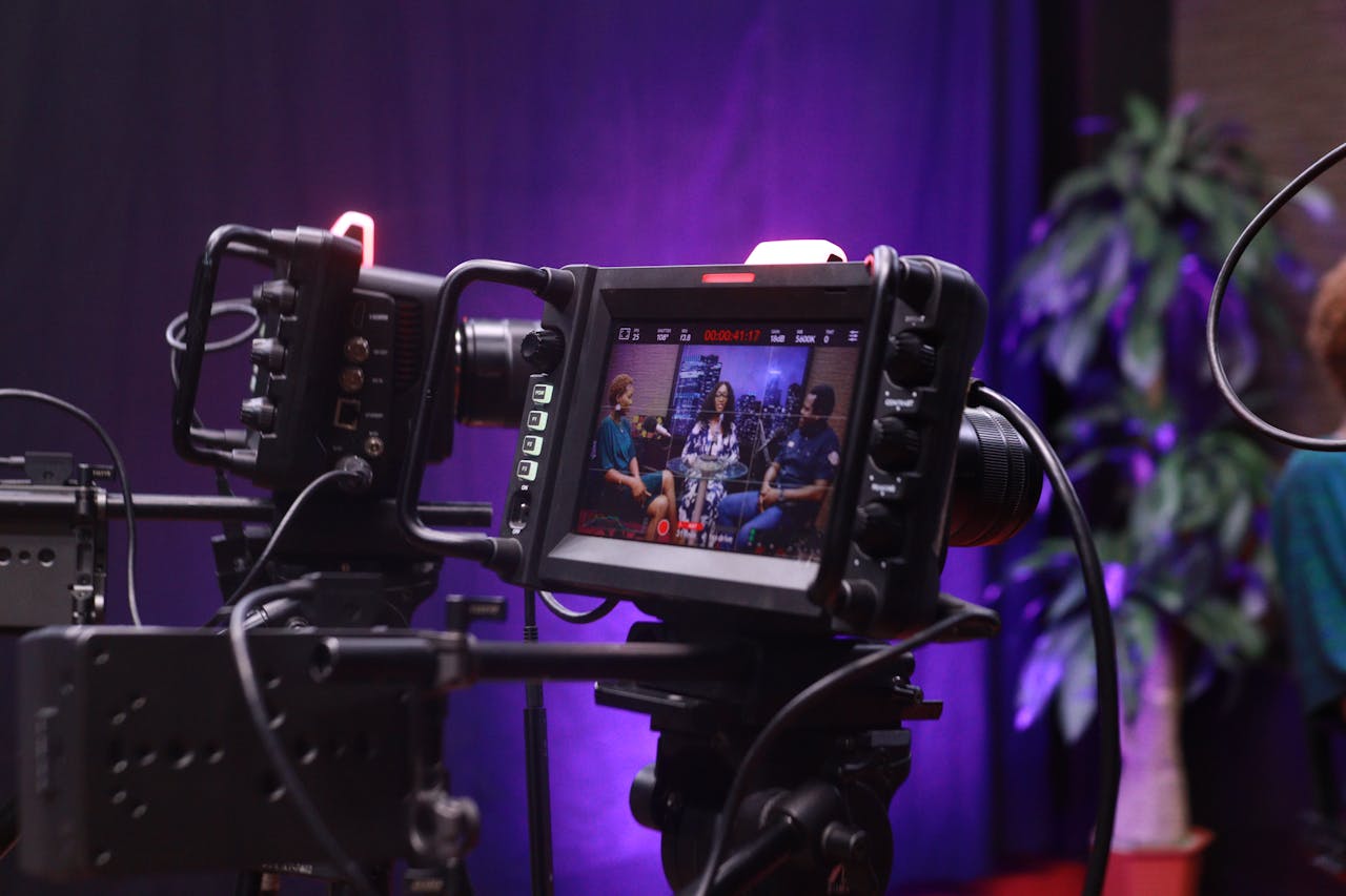 our-experience Capture of a video interview scene with professional camera equipment.