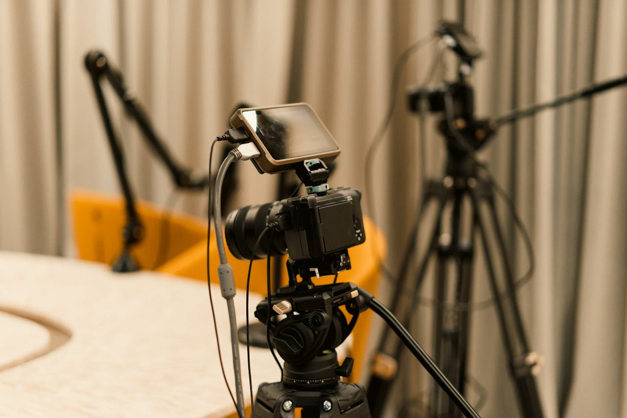 services-img A professional studio with cameras, microphones, and other equipment ready for recording or live streaming.